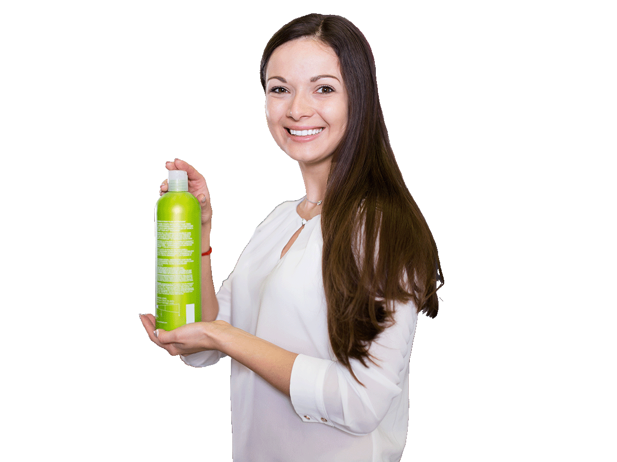 Labels and packaging translation services expert holding a shampoo bottle with labels