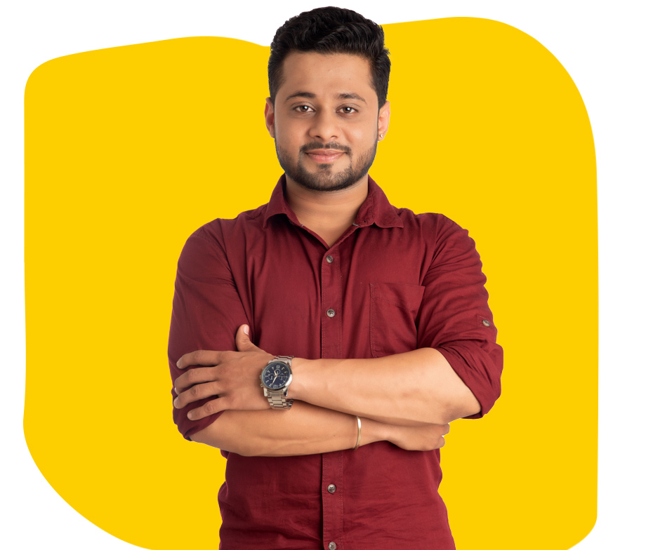 Tamil Transcreation Company young man wearing a maroon long sleeves with arms crossed wearing a watch 