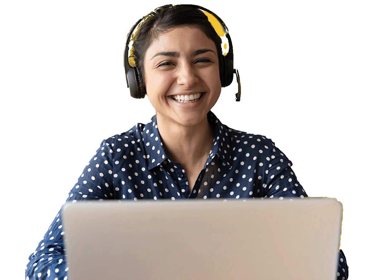 Urdu Interpreting Services professional smiling and working on laptop wearing a headset